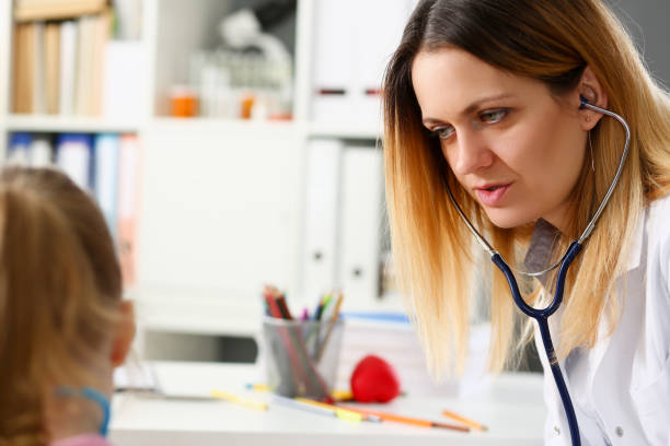 istock Child doctor with stethoscope communicate with little patient 1144738004