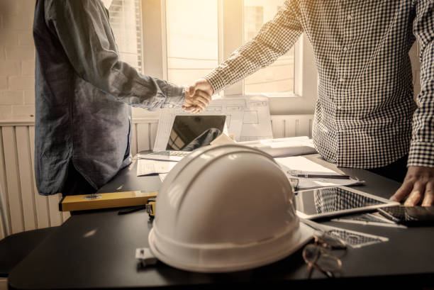 istock Shaking hand contractor engineer construction meeting business worker 1144742973