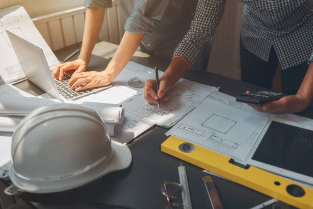 istock Business meeting construction engineer discussing architect plan 1144743132