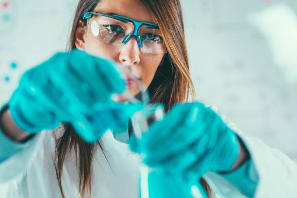 istock Young Woman Working In Laboratory 1144743354