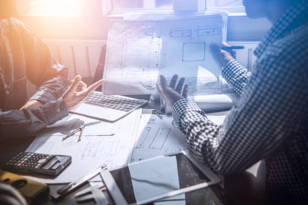 istock Business meeting construction engineer discussing architect plan 1144743935