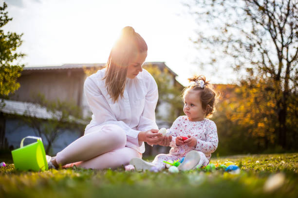 istock Playing on the lawn next to the house during the Easter 1144748018
