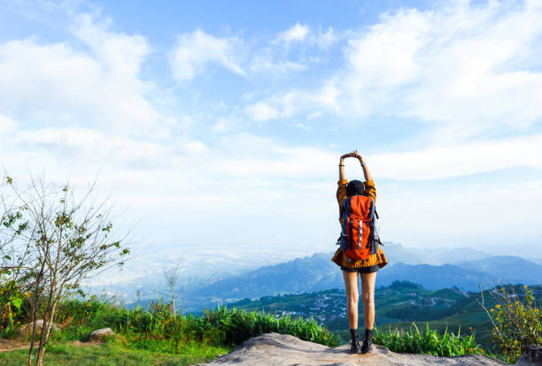 istock Woman relaxed and enjoying the nature around them. 1144750232