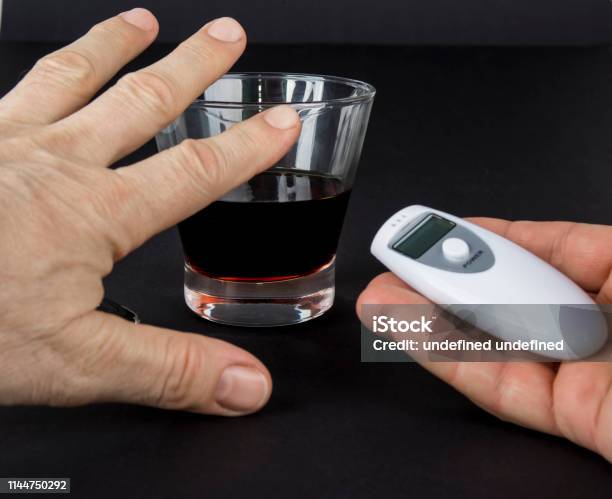 Check Alcohol Level Before You Drive Dont Drink And Drive Concept Stock Photo - Download Image Now