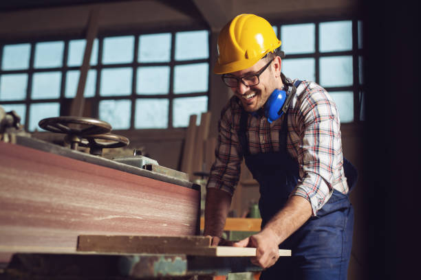 istock Carpenter working on woodworking machines in carpentry shop 1144753261