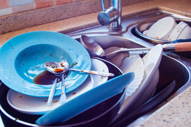 istock Dirty dishes in the sink 1144756697