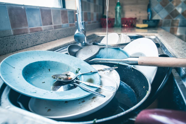 istock Dirty dishes waiting wash 1144756764