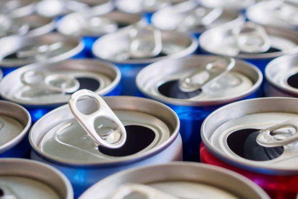 istock Empty aluminium drink cans recycling background concept 1144758379
