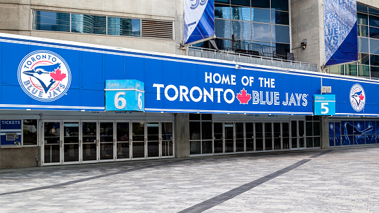 Toronto, Canada-July 02, 2018:  Blue Jays sign and entrance of Rogers center in Toronto. The Toronto Blue Jays are a Canadian professional baseball team based in Toronto.