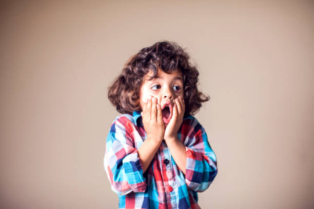 istock Shocked and surprised boy. Children, emotions concept 1144763424