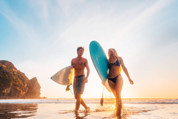 istock Heading back after a long day of surfing. 1144764883