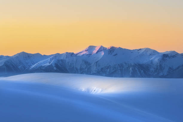 Panoramic view of the snow white mountains.