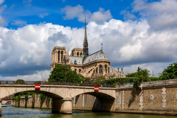 istock Notre-Dame de Paris cathedral under beautiful sky. 1144768790