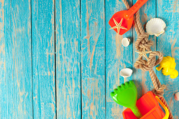 istock summer toy on wood table 1144769016