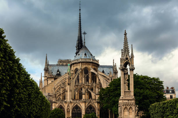 istock Notre-Dame de Paris cathedral under cloudy sky. 1144769027