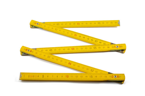 yellow folding rule - folding ruler imagens e fotografias de stock