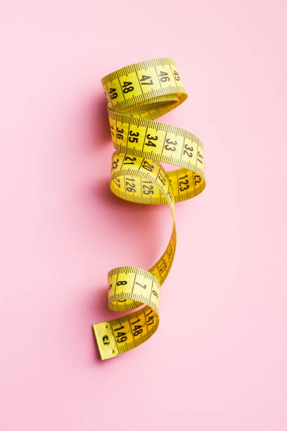 istock Yellow measuring tape of the tailor 1144772890