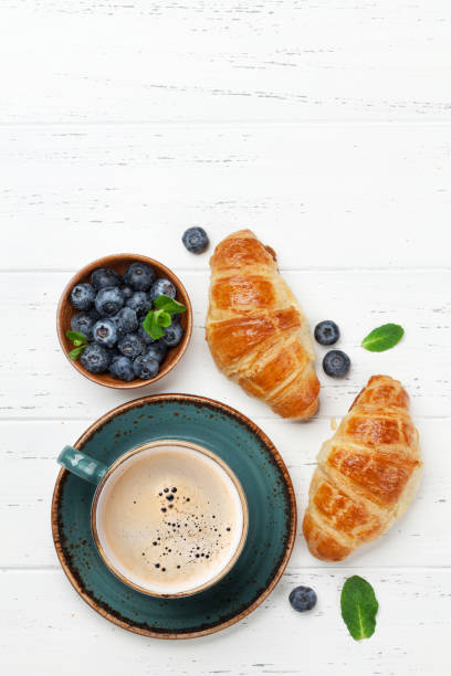 istock Coffee and croissants breakfast 1144774217
