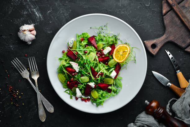 istock Salad. Arugula, blue cheese and beet salad. Top view. 1144775485