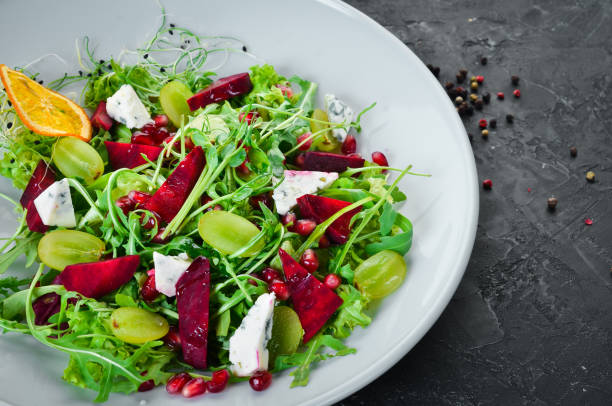 istock Salad. Arugula, blue cheese and beet salad. Top view. 1144775536
