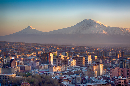 View of the city of Yerevan, the capital of Armenia.  Mount Ararat (5.137 m), the national symbol of Armenia, is the background of the city, but already on Turkish territory. The lower mountain on the left side is Little Ararat (3.896 m). In parts of Christianity it is accepted that Mount ararat is the resting place of Noah's Ark.