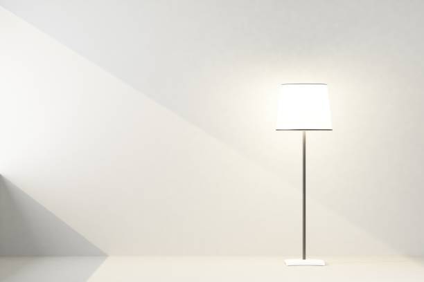 istock included floor lamp with sunbeam on wall 1144780312