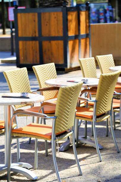 istock tables and chairs in cafe 1144783366