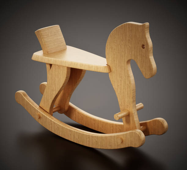 istock Wooden horse standing on black surface 1144783668