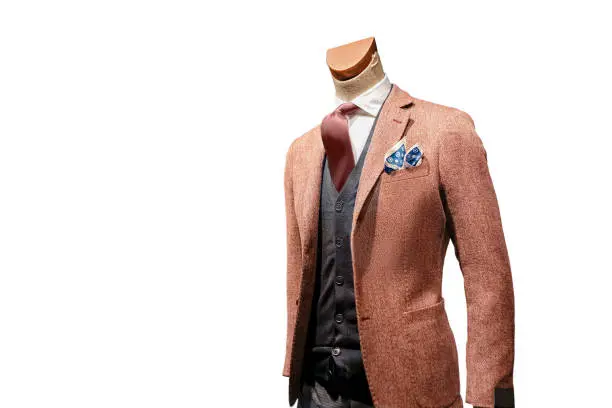 Photo of Fashion Jacket suit on the mannequin isolated on the white background