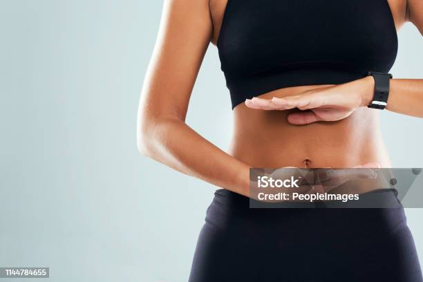 The Results Are Already Showing Stock Photo - Download Image Now - Abdomen, Healthy Lifestyle, Women