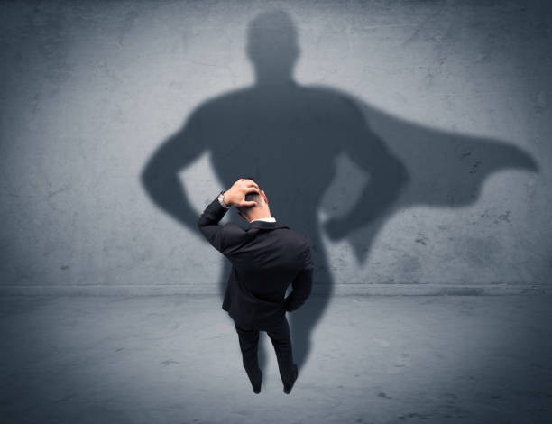 istock Successful businessman with superhero shadow 1144787387