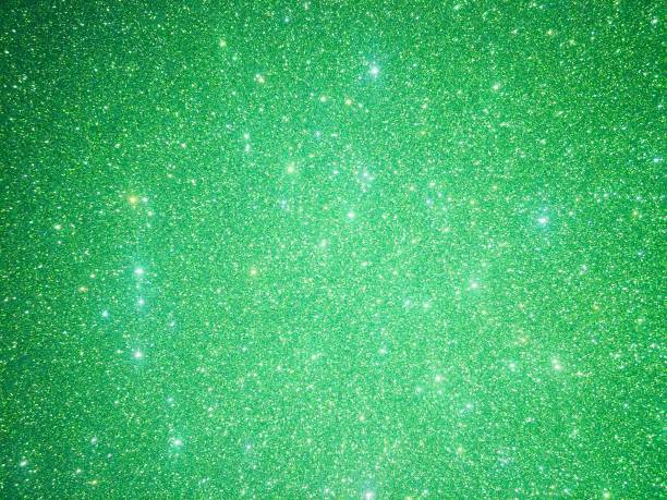 istock Green glitter texture and shiny sparkle abstract background 1144790772