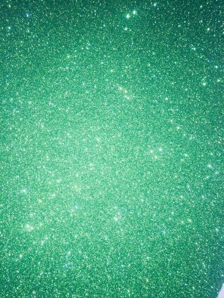 istock Green glitter texture and shiny sparkle abstract background 1144790964