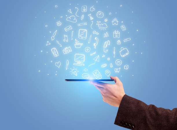 istock Hand with phone and drawn office icons 1144792433