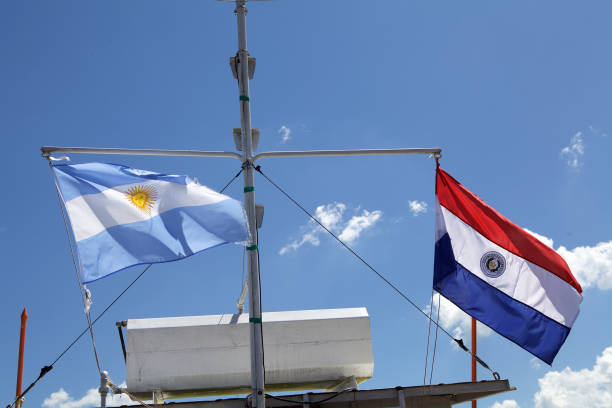 istock Argentina and Paraguay flags 1144792595