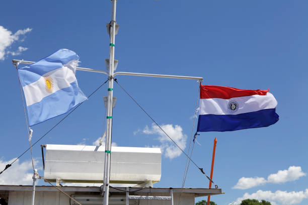 istock Argentina and Paraguay flags 1144792767