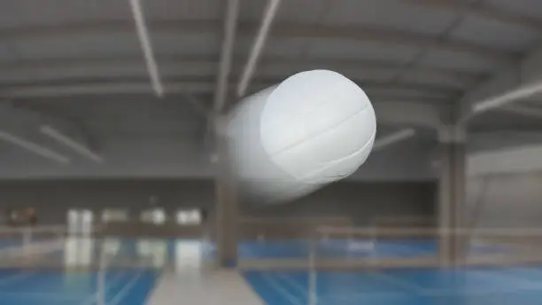 Volleyball freeze-frame with speed blur effect inside a gymnasium