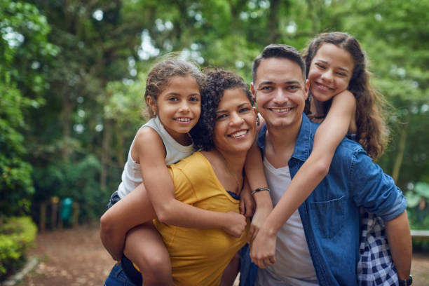 istock Mom, dad and their two little angels 1144793371
