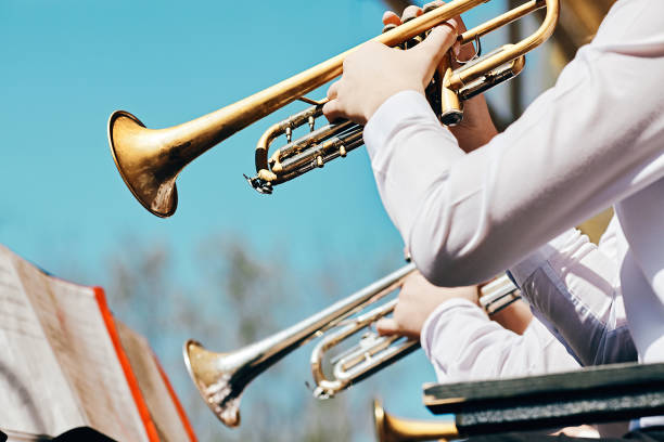 a closeup of several trumpeters - trumpet musical instrument brass band classical music imagens e fotografias de stock