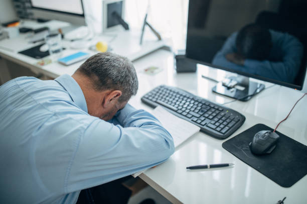 istock The businessman is tired from work 1144798180