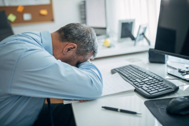istock The businessman is tired from work 1144798551