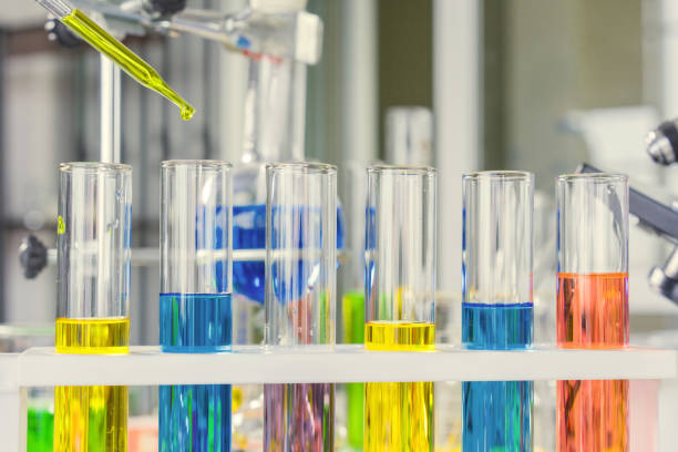 istock scientist with equipment and science experiments, laboratory glassware containing chemical liquid for research or analyzing a sample into test tube in laboratory 1144801719
