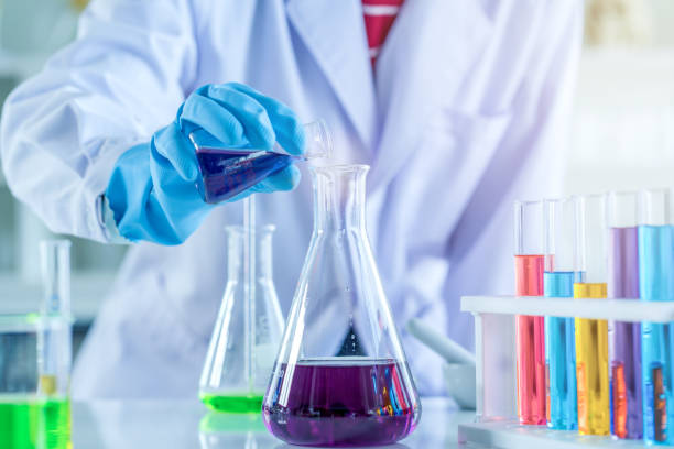 istock scientist with equipment and science experiments, laboratory glassware containing chemical liquid for research or analyzing a sample into test tube in laboratory 1144801741