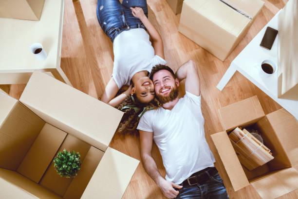 istock Couple Lying On The Floor And Taking A Break From Working 1144801771