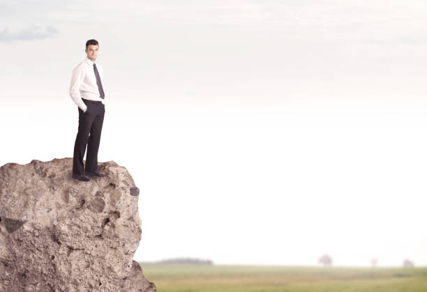 istock Happy salesman on cliff in the country 1144802575