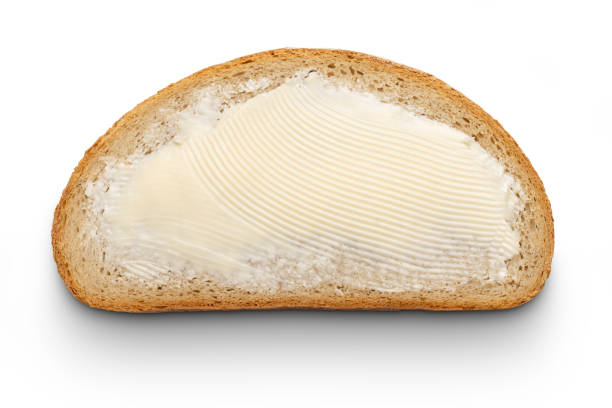 istock Bread slice with butter on white clipping path included 1144803175