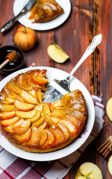 istock apple tart with caramel and cinnamon on wooden table 1144804006