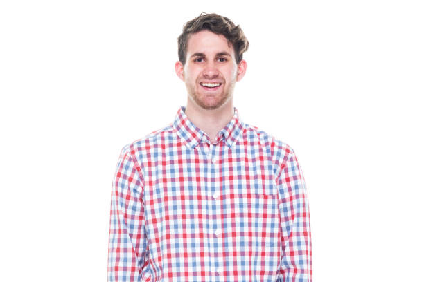 istock Attractive young man wearing a checked shirt and jeans - hands by side 1144804098