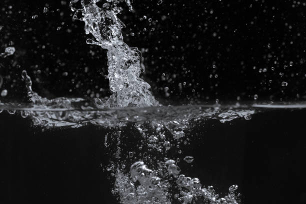 istock Water splash isolated on black background 1144805822