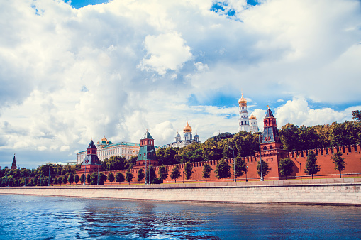 Moscow. Russia. May 29, 2019. Red Square in Moscow. View of the Spasskaya clock tower and the Kremlin wall. Cityscape in the city center against a blue sky.